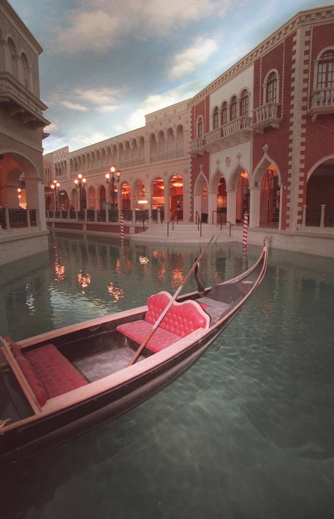 A gondola rests near the Grand Canal Shoppes at the Venetian Hotel on the day of the soft openi ...